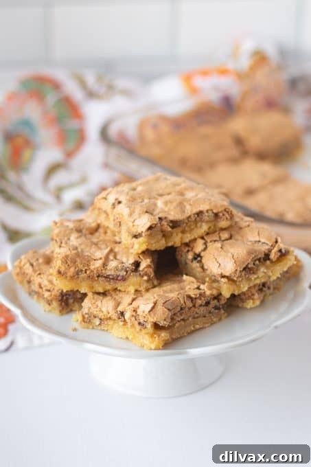 Delta Prime 3 Delta Bars plated, showcasing their distinct layers of cookie base and meringue topping.