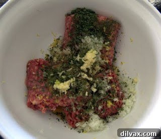 Freshly prepared meatball mixture in a bowl, ready for shaping, hinting at the delicious meal to come.