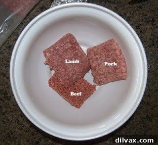 Half-eaten meatball with a quirky, almost comical expression, resembling a cartoon character.