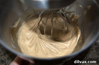 Spiced Butterscotch Cupcakes with Cream Cheese Frosting 2 Partially baked cupcakes in a muffin tin