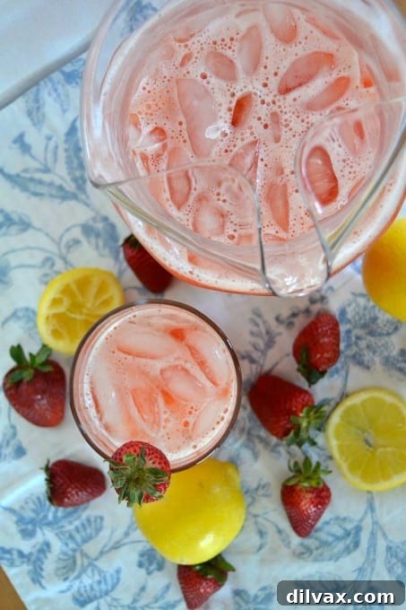 Lemonade Libations: 40+ Ways to Refresh This Summer 3 Delicious Fresh Strawberry Lemonade, a perfect blend of sweet strawberries and tangy lemons for summer refreshment.