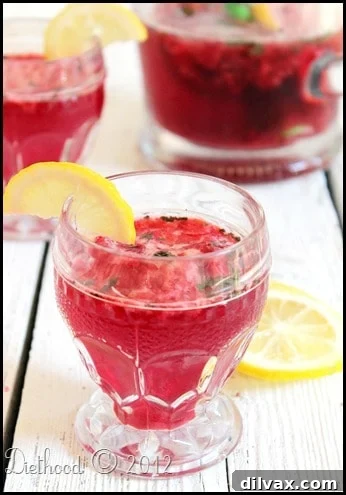 Lemonade Libations: 40+ Ways to Refresh This Summer 33 Bubbly Raspberry and Lime Soda Lemonade, a fizzy and fruity concoction.