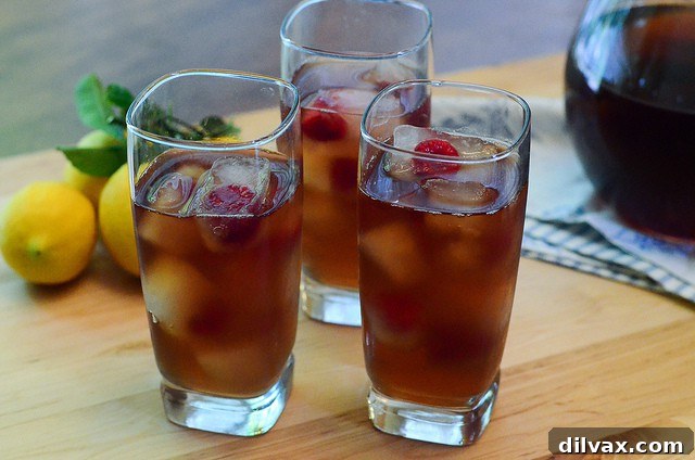 Slow Melt Arnold Palmer, a refreshing mix of iced tea and lemonade with melting ice, served in a glass.