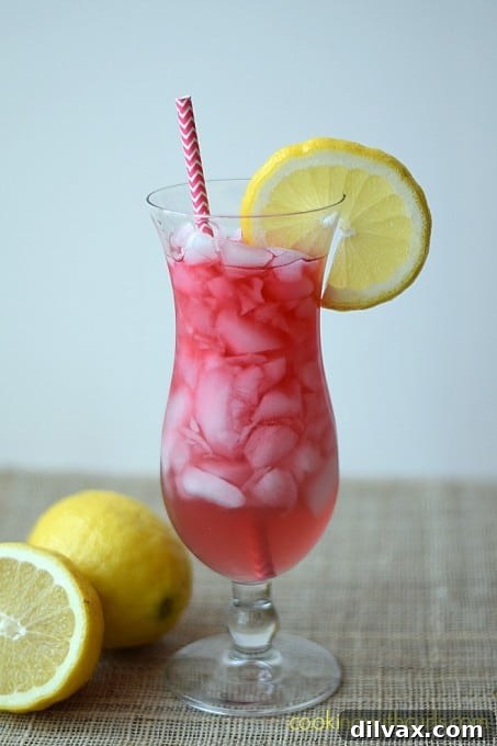 Lemonade Libations: 40+ Ways to Refresh This Summer 42 Exotic Passion Tea Lemonade Cocktail, a vibrant and flavorful alcoholic drink.