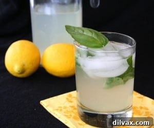 Spiked Basil Lemonade (Sugar-Free), a cocktail with basil leaves and lemon, without added sugar.