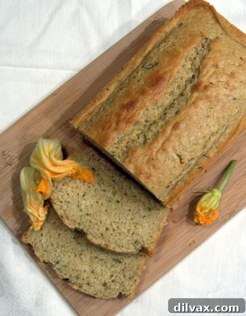 Irresistibly Moist Zucchini Bread 4 Sliced homemade zucchini bread on a cutting board