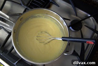 Day 124: Indian Pudding Delight 2 Hot milk poured over cornmeal, stirring constantly