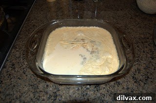 Day 124: Indian Pudding Delight 5 Indian Pudding baking in a water bath in the oven