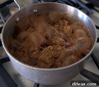 Close-up of the root beer cake batter being prepared in a mixing bowl.