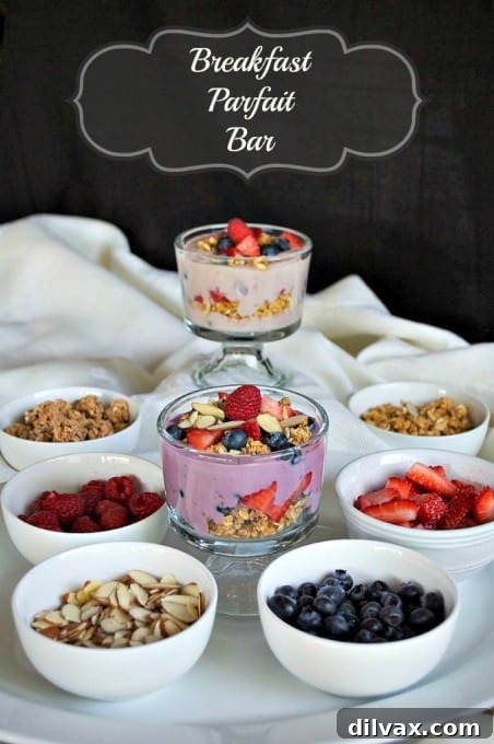 A beautifully assembled breakfast parfait with layers of yogurt, fruit, and granola, photographed for sharing on Pinterest.