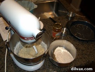 Jam or Marmalade Bars: A Delicious Dilemma 4 Mixing together flour, baking powder, cinnamon, cloves, and salt.