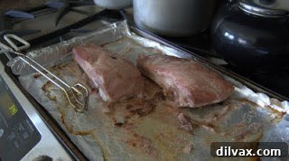 Perfectly cooked spare ribs with a rich, glossy barbecue sauce, ready to be served