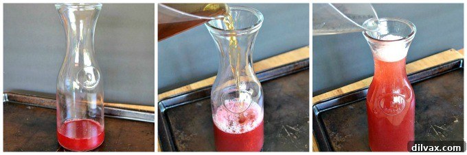 A hand pouring Snapple Lady LiberTEA into a pitcher, highlighting the vibrant colors and fresh ingredients.