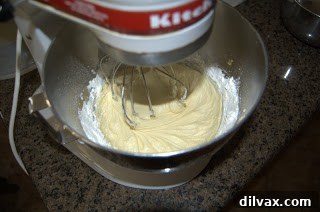 Freshly baked cake layers cooling in pans