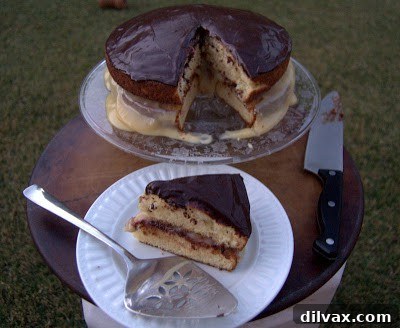 Assembled Boston Cream Pie with chocolate glaze