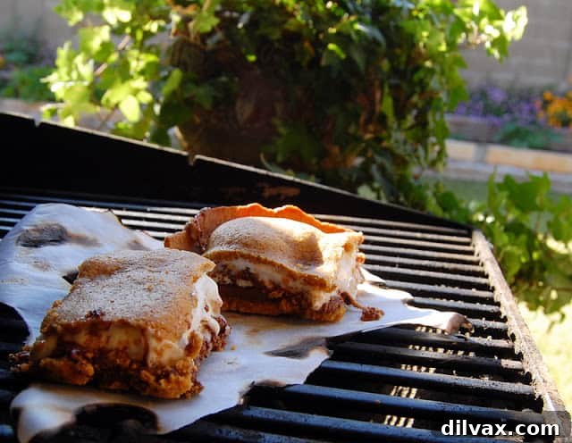 Freshly baked S'mores Bars in a baking dish, warm and gooey