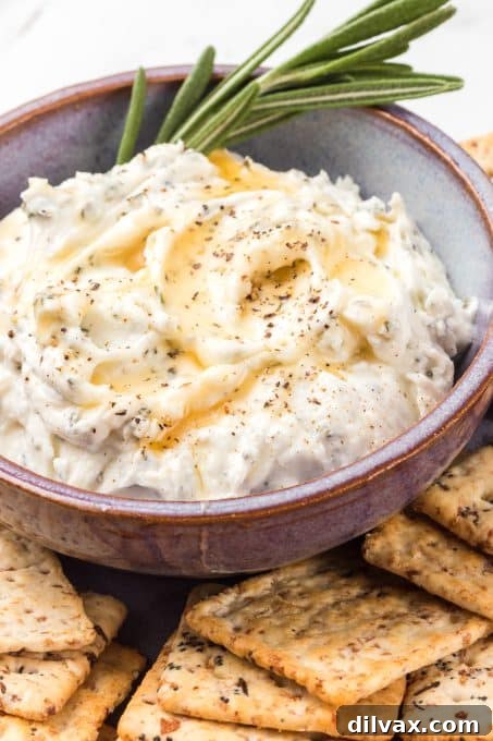 An easy appetizer - goat cheese, honey and rosemary.