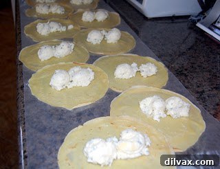 Crepe with cheese filling, ready to be rolled.