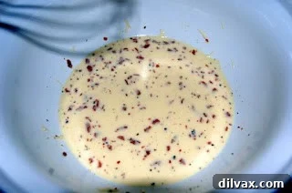 Savory Spinach, Bacon and Gruyere Quiche 6 Quiche filling ingredients in a large bowl