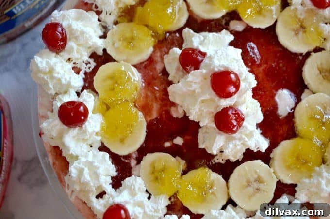 Detail shot of the ice cream and fruit layers in the Banana Split Ice Cream Cake