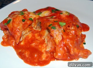 Finished enchiladas covered with melted, golden-brown cheese