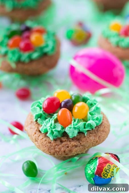 Hidden Easter Delights 3 A close-up of an Easter Egg Hunt Surprise Cookie, showcasing the colorful jelly beans and festive green frosting.