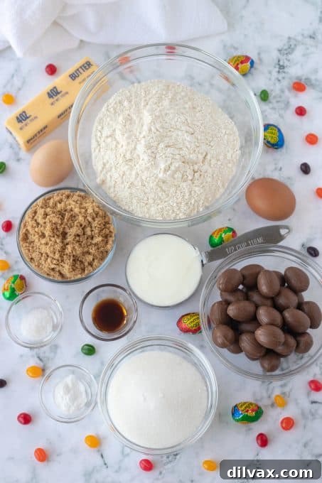 Ingredients for Easter cookies with Cadbury Creme Eggs arranged on a counter.