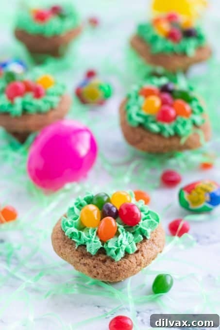 Hidden Easter Delights 7 A delicious Easter cookie revealing a Cadbury Creme Egg inside, surrounded by green frosting and jelly beans.