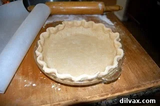 Day 79: Lemon Meringue Pie 3 Pie crust fitted into a pie pan with crimped edges