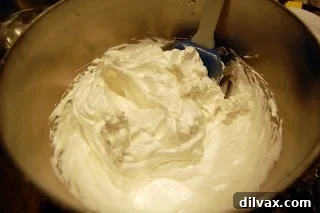 Day 79: Lemon Meringue Pie 6 Stiff and shiny meringue in a mixing bowl