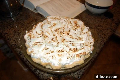 Day 79: Lemon Meringue Pie 7 Lemon Meringue Pie with golden brown meringue peaks