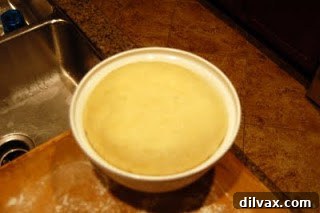 Another angle of the challah dough in the bowl before rising.