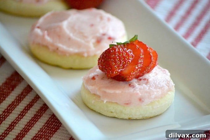 Sugar cookies with strawberry buttercream frosting