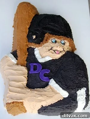 Final decorated baseball player birthday cake