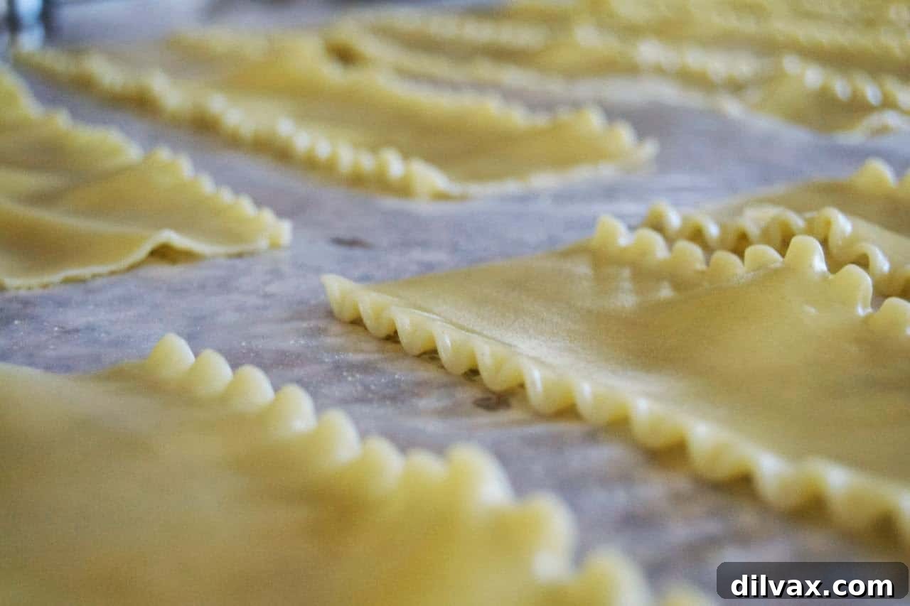 Savory Spinach Ricotta Lasagna Rolls 3 Preparation of spinach filling for lasagna roll-ups in a bowl