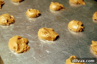 Brown Sugar Drop Cookies ready for baking on a greased sheet