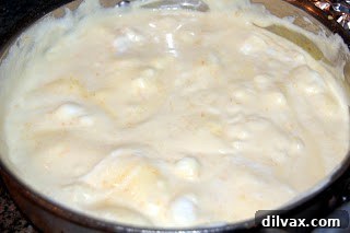 Soufflé mixture gently folded, ready for baking dish