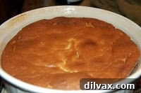 Effervescent Orange Soufflé with Grand Marnier Glaze 9 Soufflé starting to deflate slightly a few minutes after baking