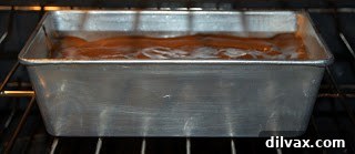 Gluten-Free Chocolate Pound Cake batter poured into a loaf pan.