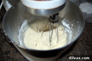 Cake batter in mixing bowl, light and fluffy, ready for baking.