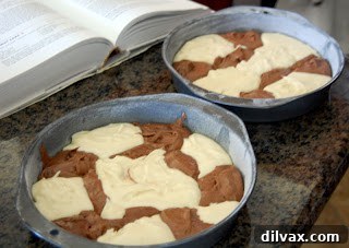 Close-up of marble cake batter showcasing distinct, artistic swirls before baking.