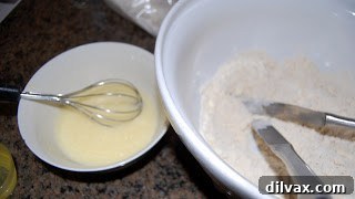 Savory Gluten-Free Ham and Cheese Pockets 2 Gluten-free pie crust dough in a bowl, showing crumbly texture before adding liquid.