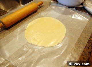 Savory Gluten-Free Ham and Cheese Pockets 3 Gluten-free pie dough rolled out and cut into a semi-circle.