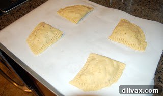 Savory Gluten-Free Ham and Cheese Pockets 5 Gluten-free ham and cheese pocket pie, folded and sealed with a fork.