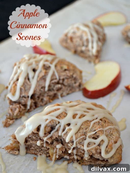 Maple-Glazed Apple Cinnamon Scones 3 Beautifully baked apple cinnamon scones cooling on a wire rack.