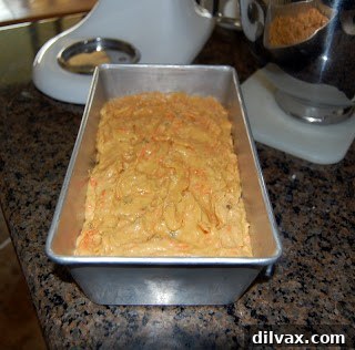 Carrot and raisin bread baking in a loaf pan