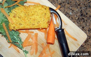 Sliced carrot and raisin bread cooling on a wire rack
