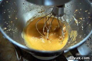 Creamed butter and sugar mixture in a mixing bowl.