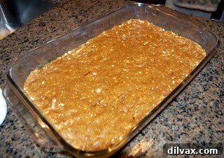 Freshly baked butterscotch brownies, golden brown and firm, cooling in the pan.