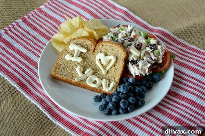 Delicious Cranberry Apple Chicken Salad with a handwritten note on bread, showcasing Best Foods mayonnaise.